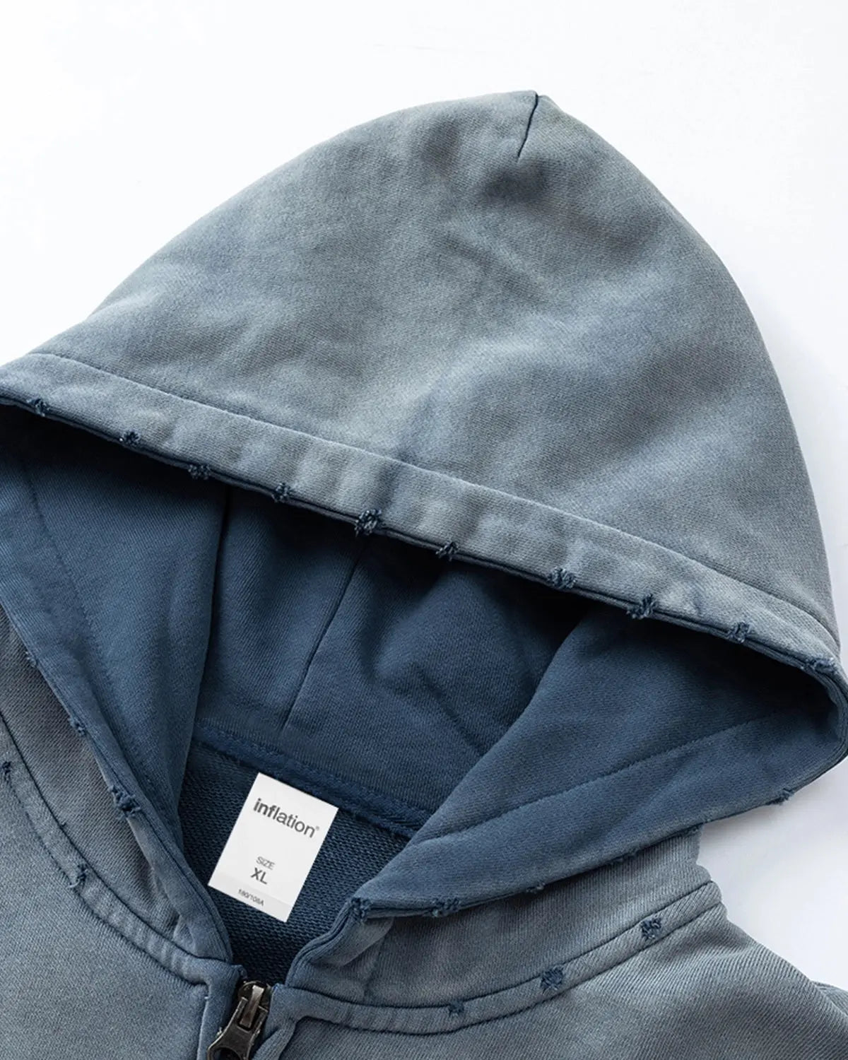 Blue distressed acid wash zip-up hoodie from Inflation Streetwear, featuring a casual fit and front zipper design.