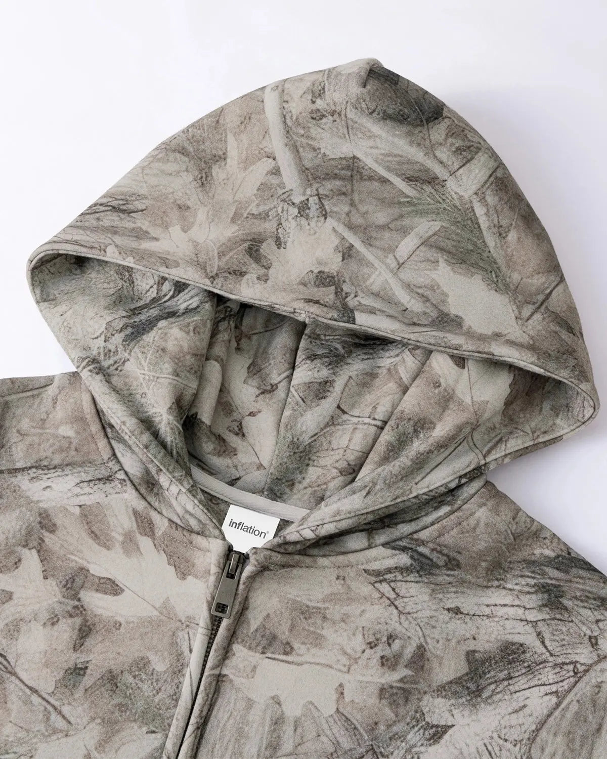 Inflation Realtree camo zip-up hoodie with adjustable drawstrings and front pockets, featuring a camouflage pattern and hoodie design.