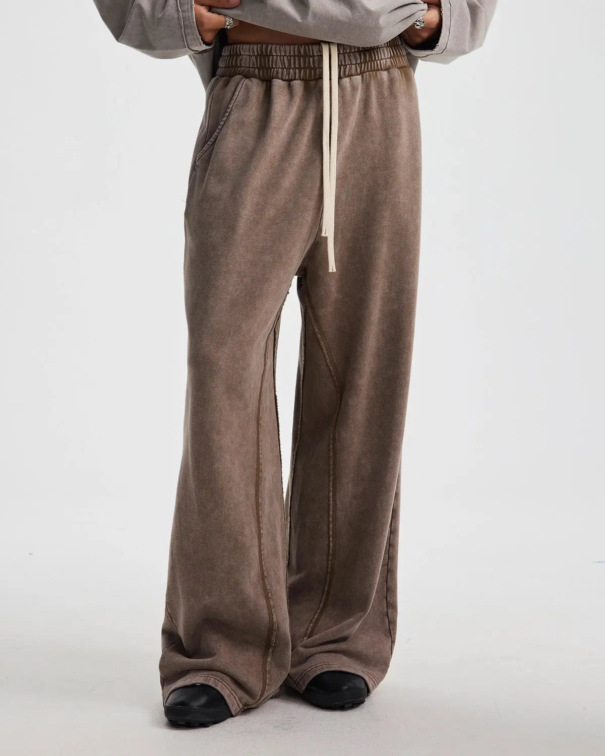 Inflation streetwear straight leg acid wash sweatpants with relaxed fit and casual style, featuring distressed denim-inspired look.