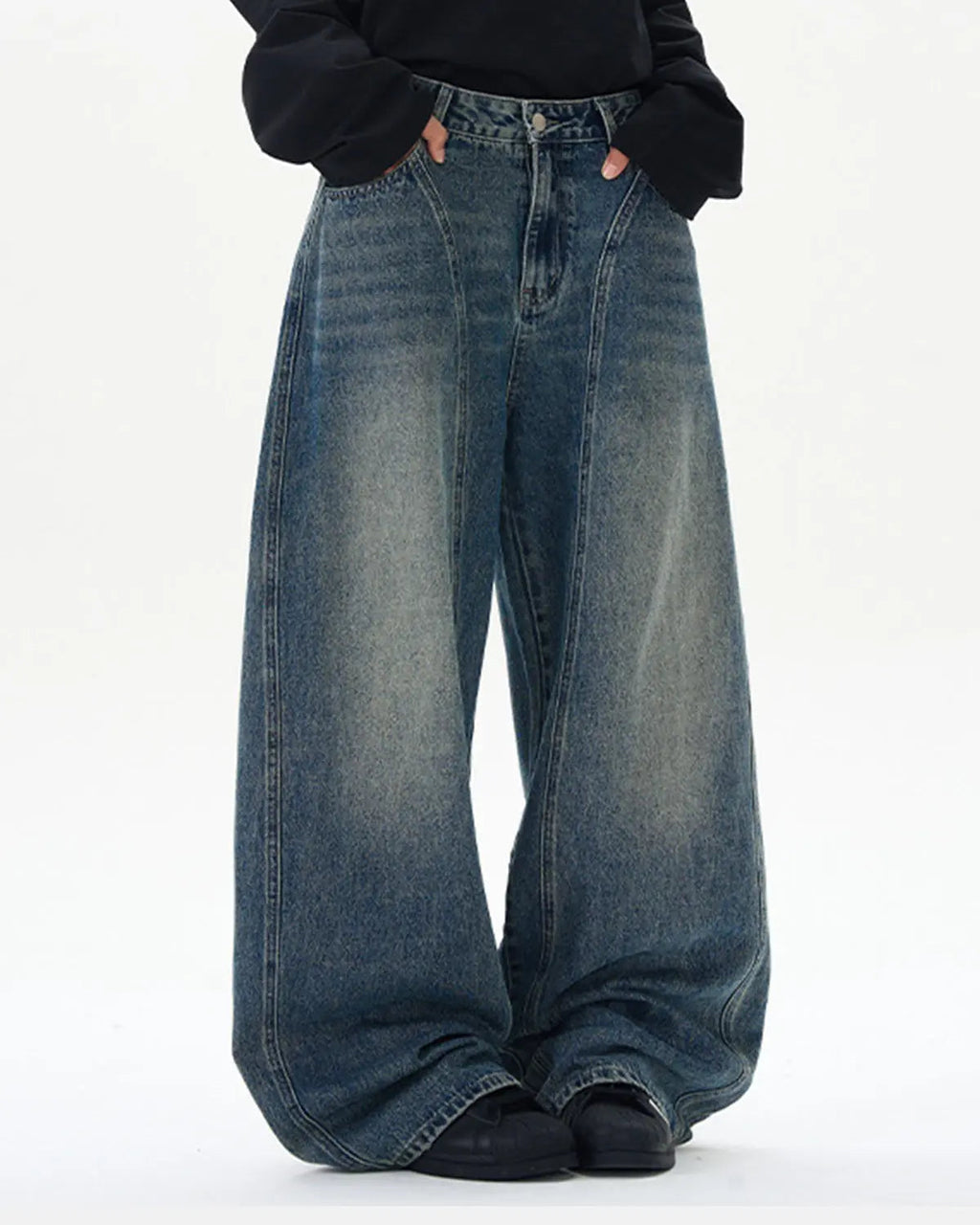 Deconstructed washed barrel jeans by Inflation Streetwear featuring distressed detailing and a relaxed fit.