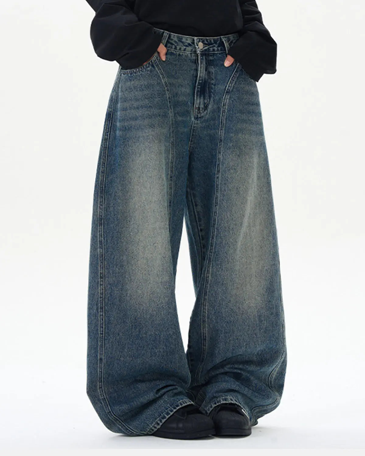 Deconstructed washed barrel jeans by Inflation Streetwear featuring distressed detailing and a relaxed fit.