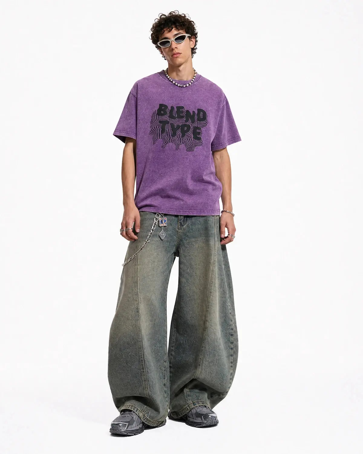 Purple washed oversized graphic T-shirt by INFLATION Streetwear, featuring bold design and relaxed fit for casual style.
