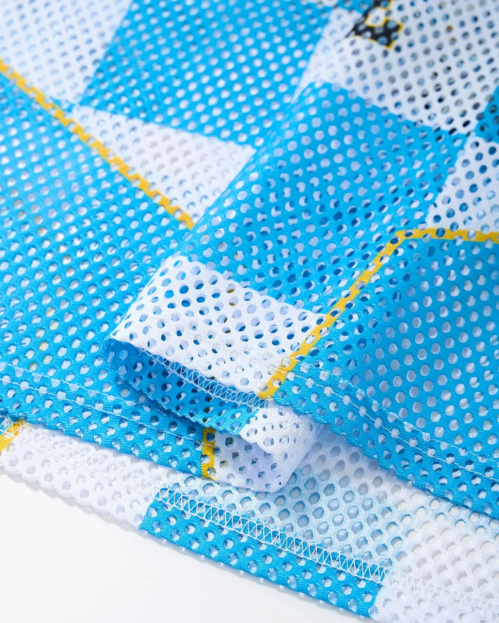 Inflation Streetwear varsity checkerboard mesh jersey featuring black and white checkerboard pattern and breathable mesh fabric.