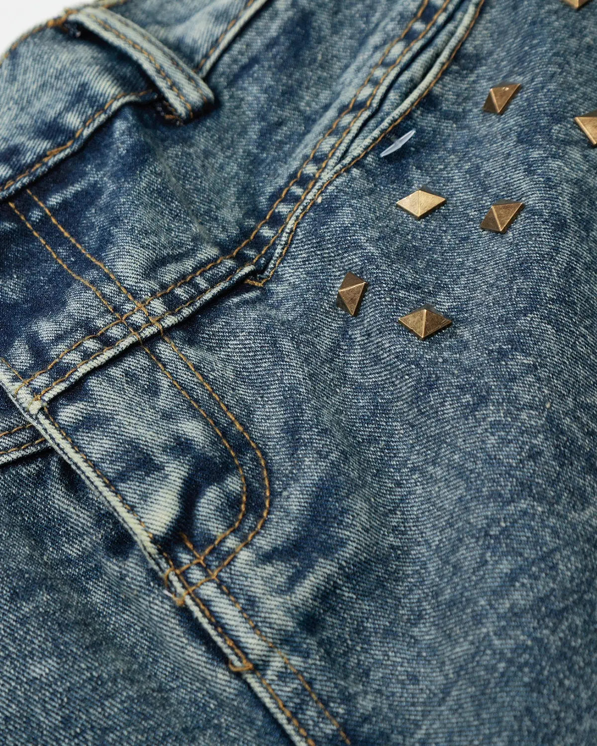 Inflation streetwear studded washed long baggy jorts pants with distressed denim and metal stud details, casual street style clothing