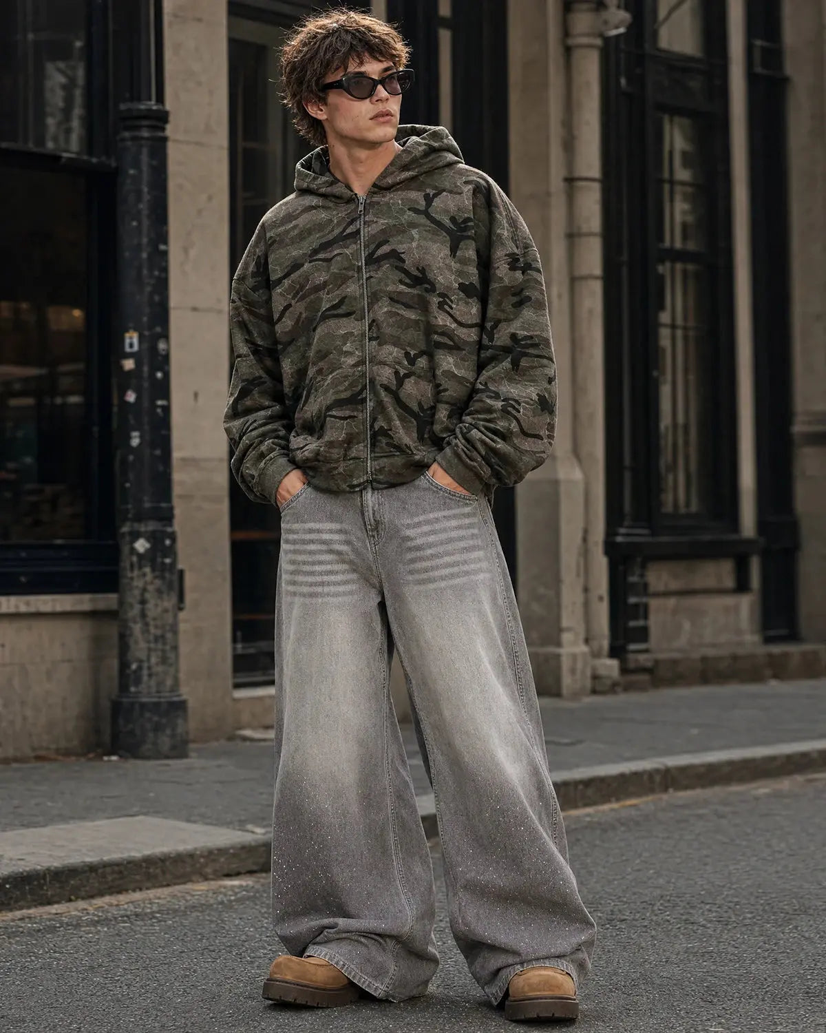 Camouflage zip-up jacket by INFLATION featuring a military-inspired camouflage pattern and a front zipper closure.
