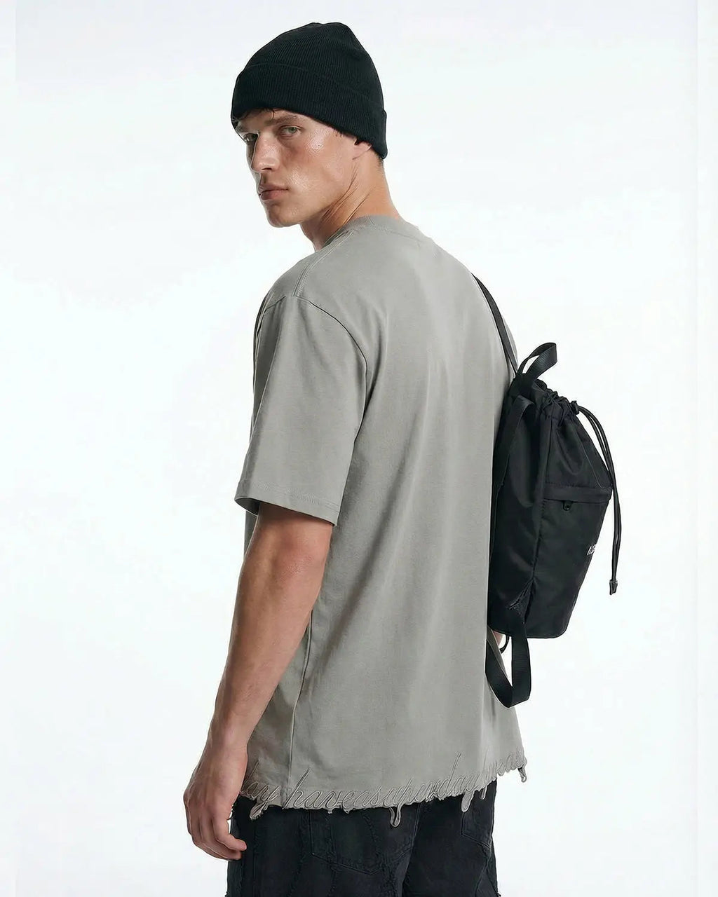Inflation Streetwear embroidered frayed hem oversized T-shirt, casual fit with detailed embroidery and distressed hem, black color.