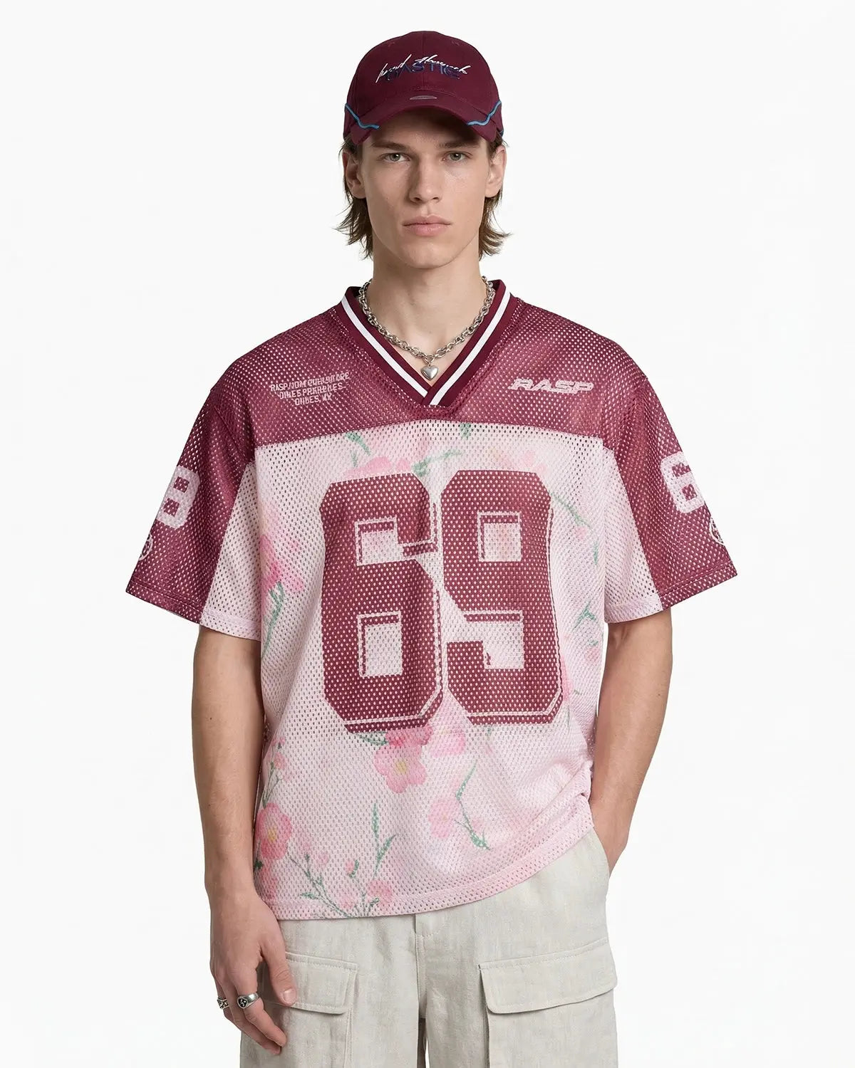 Inflation Floral Digital Print Mesh Jersey showcasing vibrant floral patterns and lightweight mesh fabric for streetwear style.