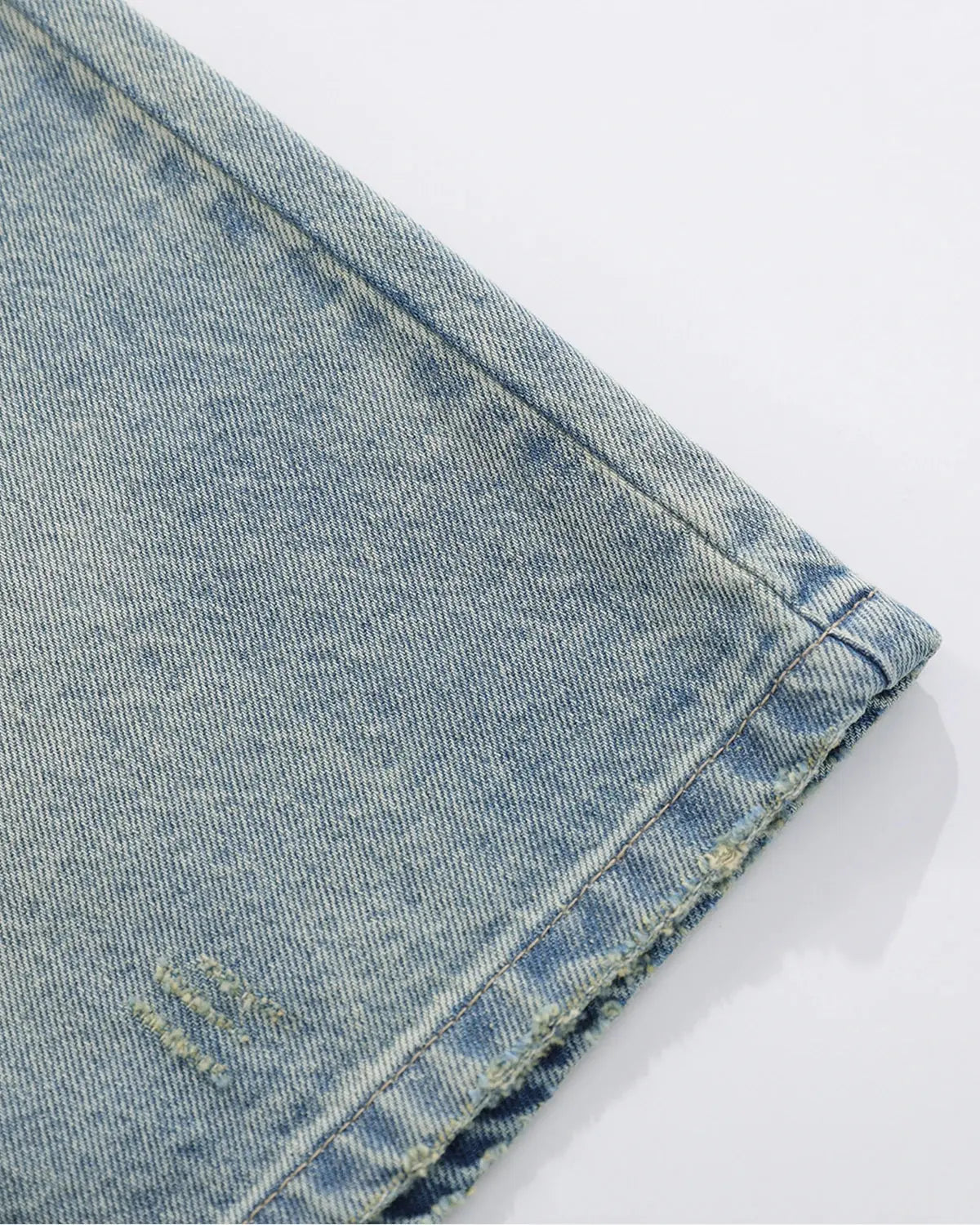 Inflation Dollar Patch Embroidery Denim Jorts featuring distressed denim and bold dollar patch embroidery for streetwear style.