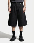 Longline wide-leg jorts pants by INFLATION Streetwear featuring distressed denim and relaxed fit for casual style.