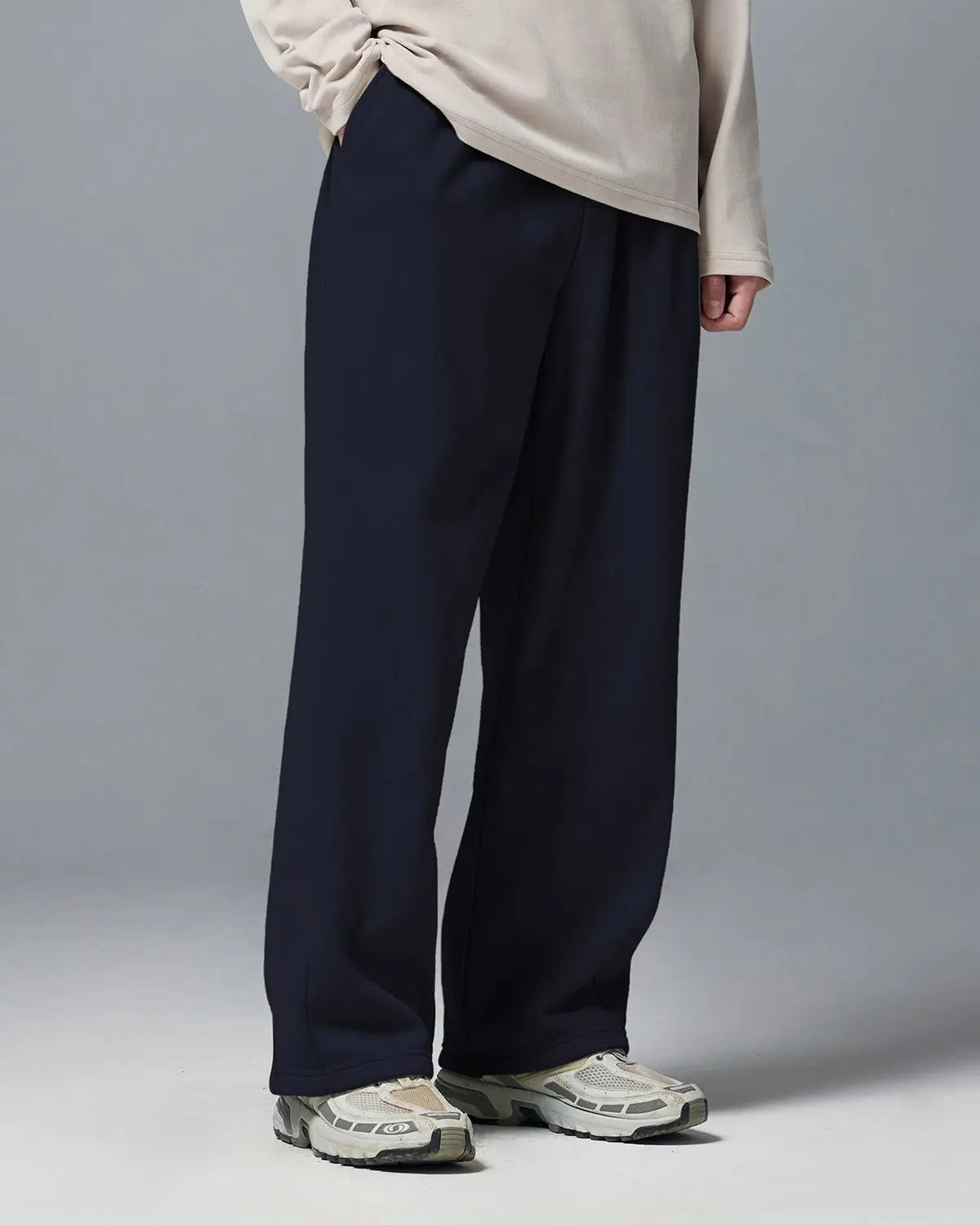 Inflation Stretch Thermal Fleece Sweatpants in black, featuring a relaxed fit and elastic waistband for comfortable casual wear.