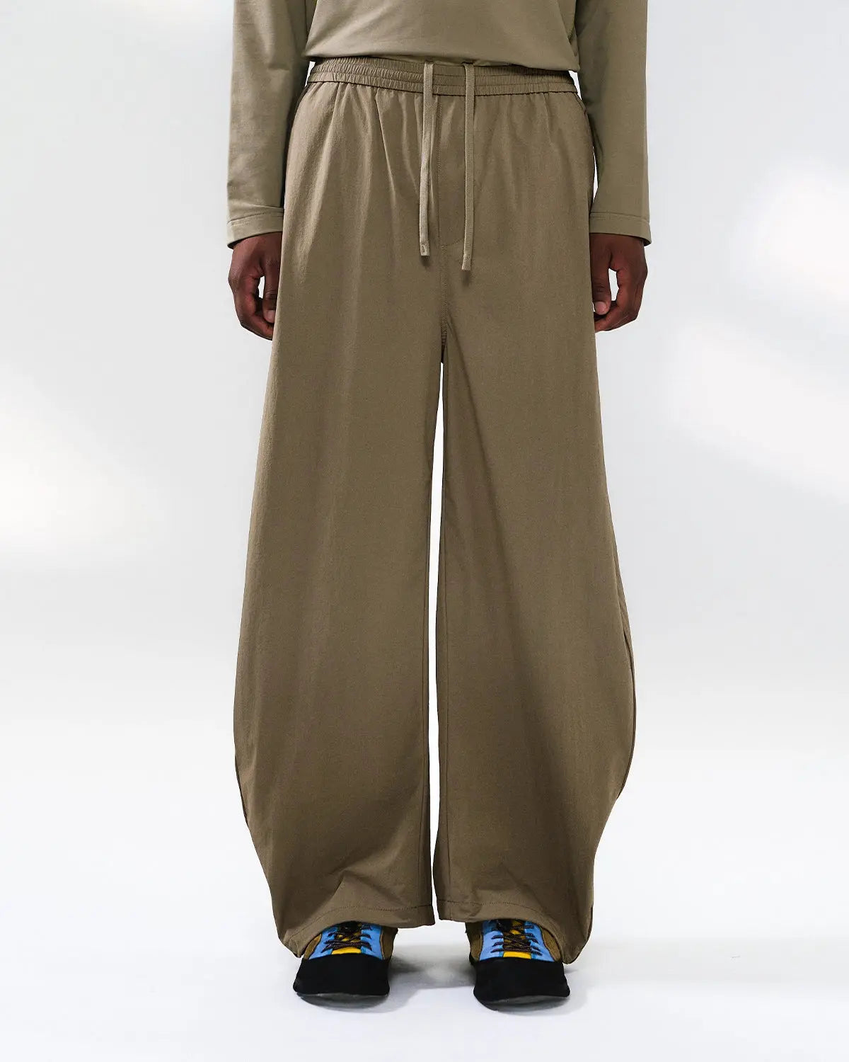 Inflation outdoor quick dry track pants in black, featuring sleek design and athletic fit for active wear and outdoor activities.