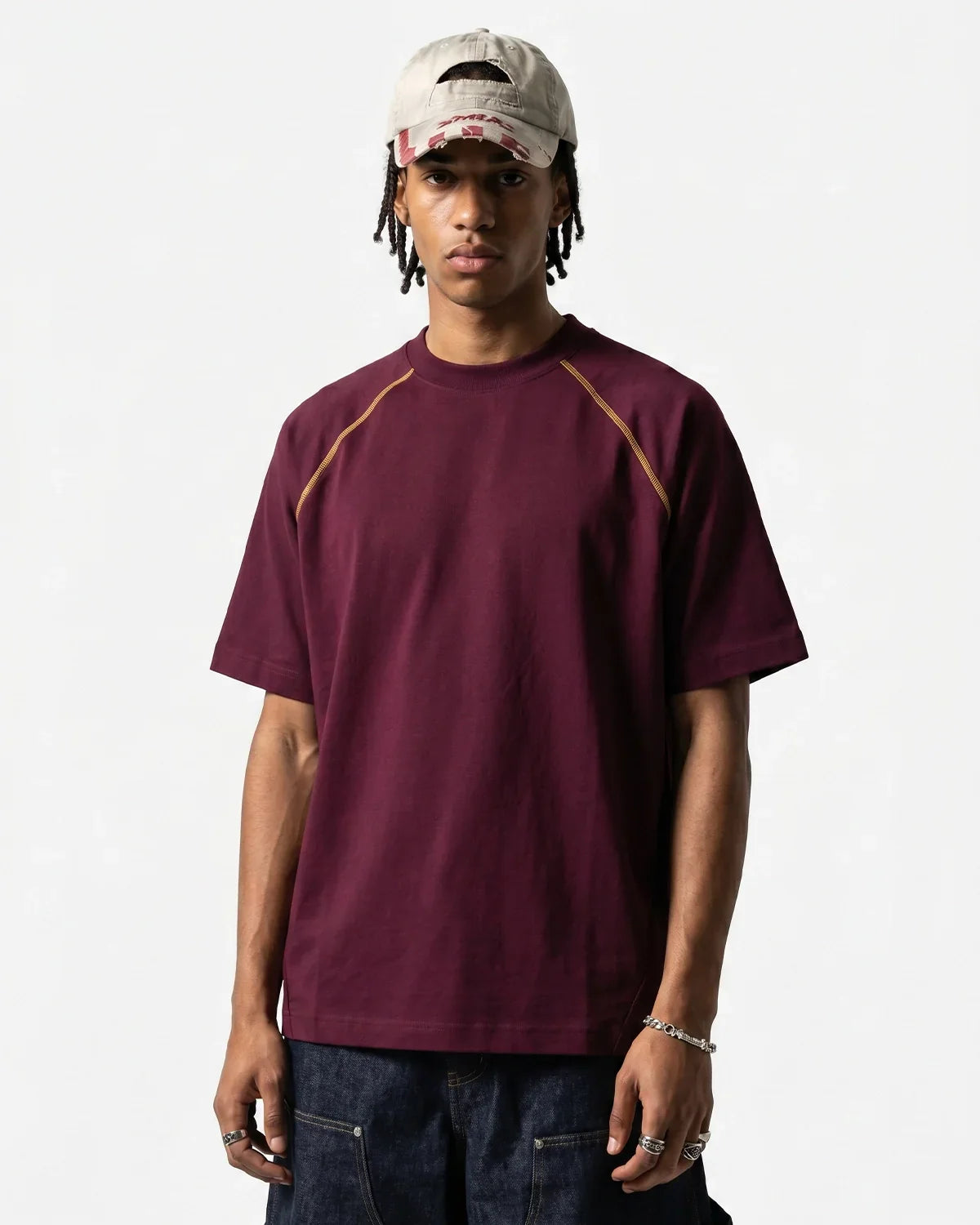 Inflation Streetwear contrast stitching stretch T-shirt showing vibrant stitching details and slim fit style on a model.