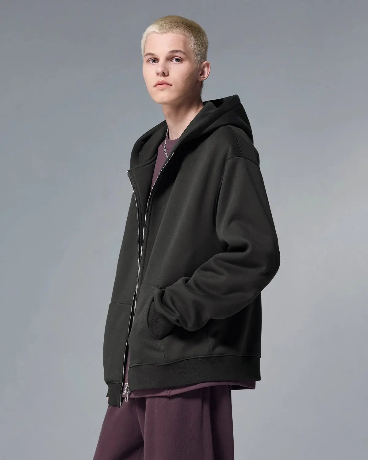 Inflation Streetwear fleece zip-up oversized hoodie in soft fabric, featuring a relaxed fit and hood with front zipper closure.