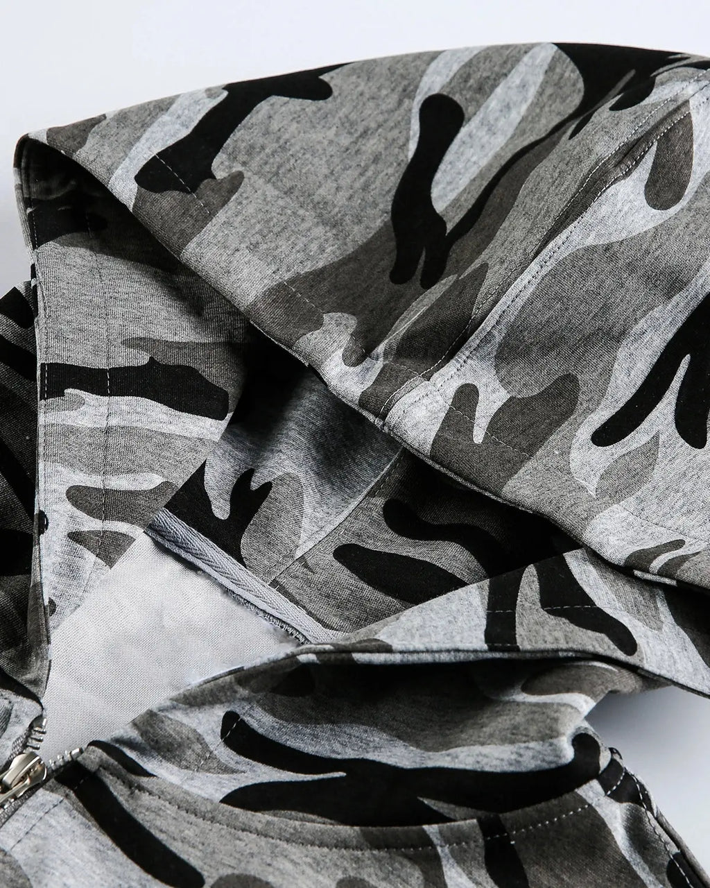 Cropped camouflage zip-up hoodie by INFLATION Streetwear, featuring a military print, front zipper, and comfortable fit.