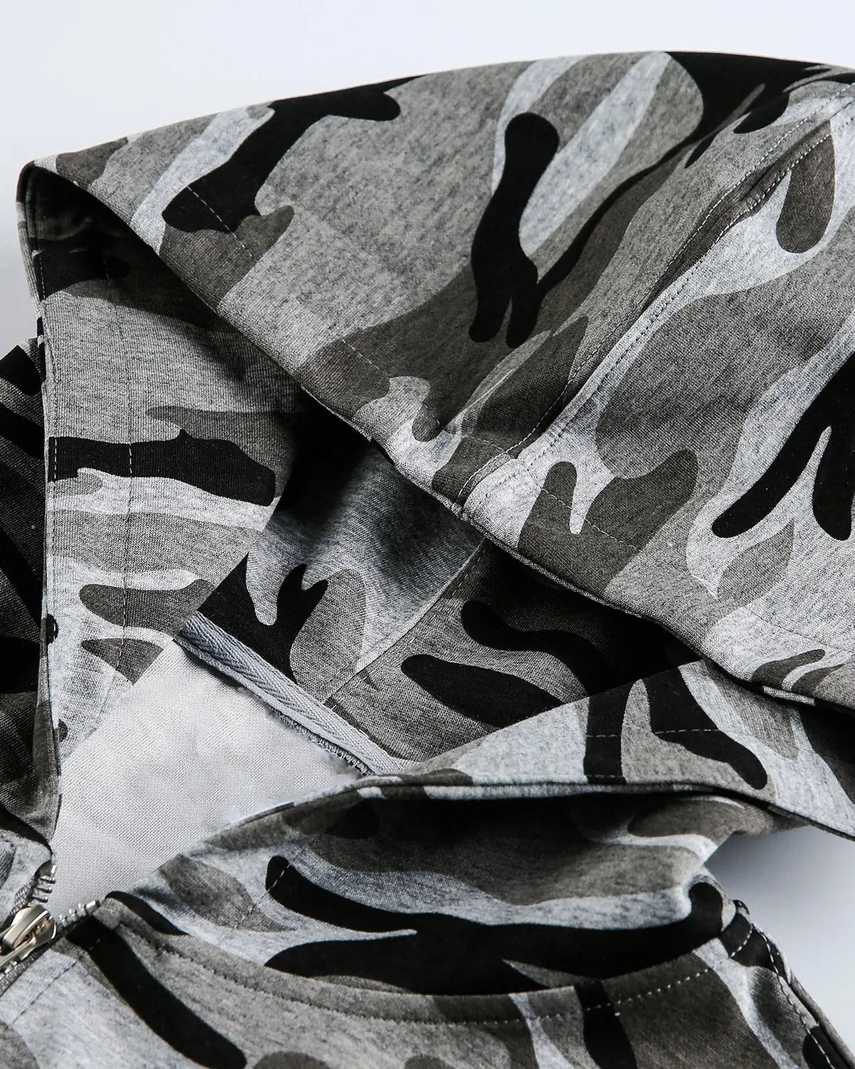 Cropped camouflage zip-up hoodie by INFLATION Streetwear, featuring a military print, front zipper, and comfortable fit.