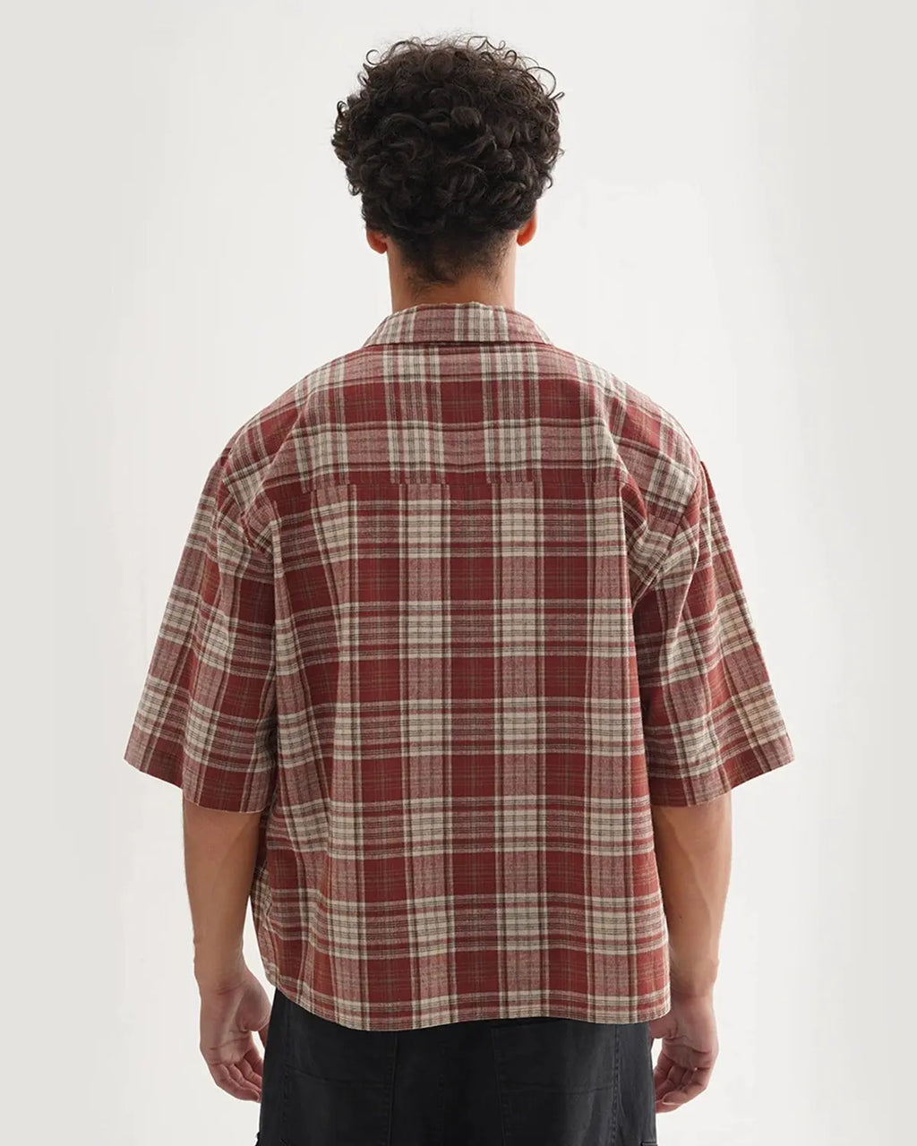 Boxy fit plaid shirt by INFLATION, casual streetwear shirt with a relaxed fit and bold plaid pattern, shown on a hanger.