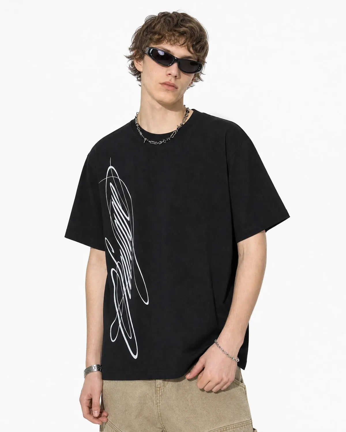 Inflation Streetwear Script Graphic Oversized T-Shirt featuring bold print and relaxed fit, casual streetwear style.