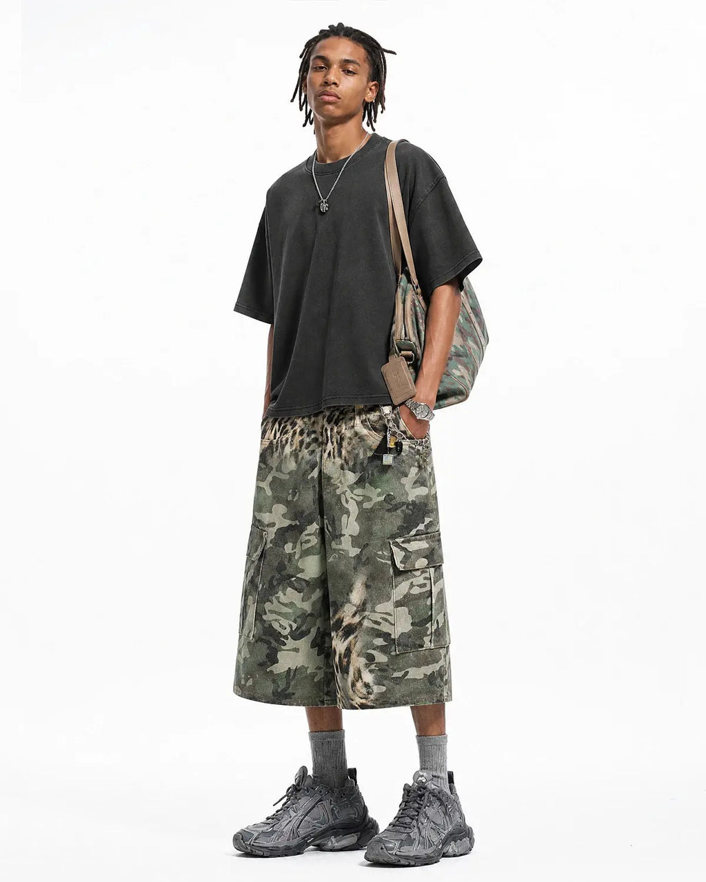 Leopard camo cargo longline shorts from INFLATION Streetwear featuring bold camo pattern and extended length style.