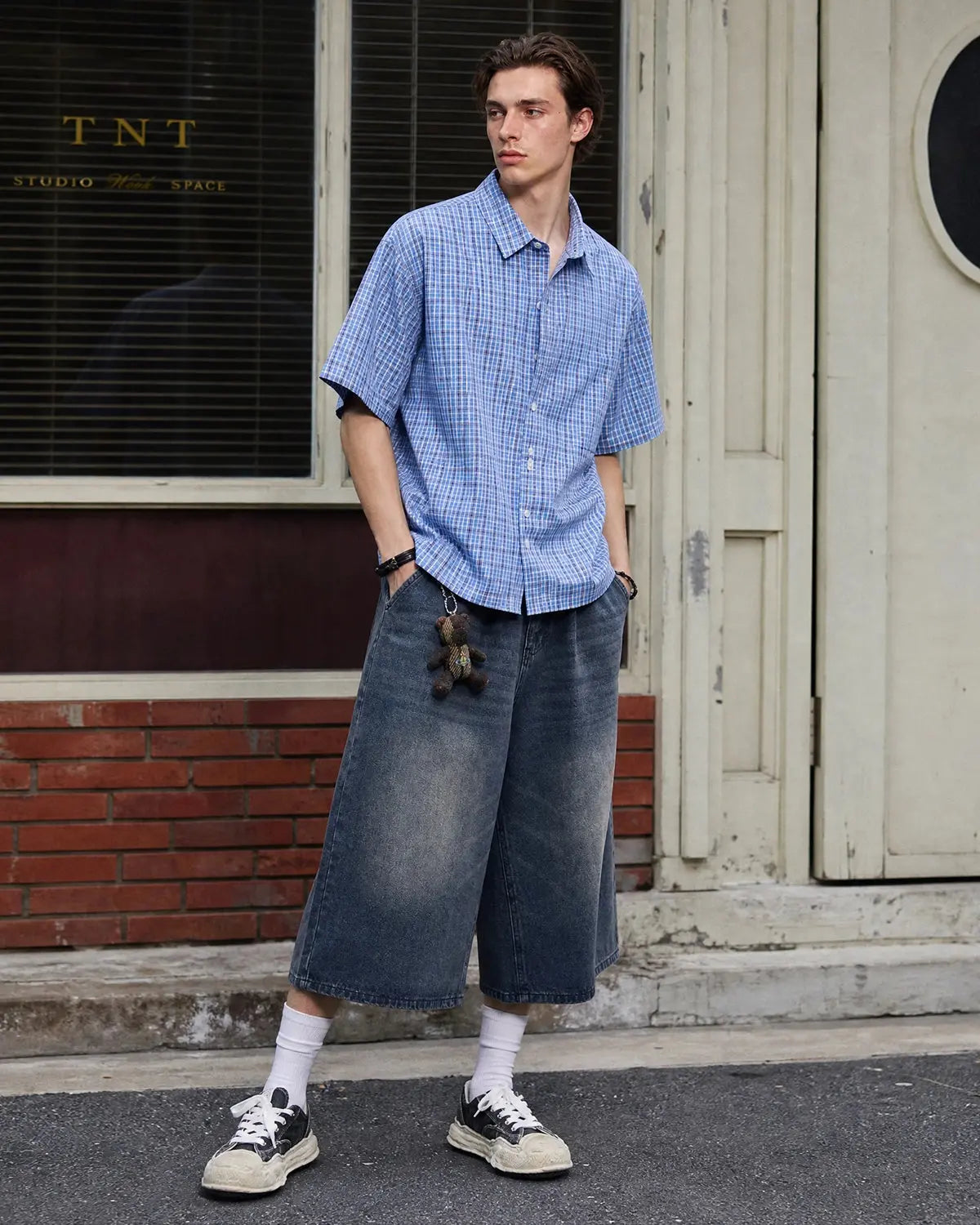 Inflation Double Waist Baggy Jorts denim shorts with oversized fit, featuring distressed details and multiple pockets for streetwear style.