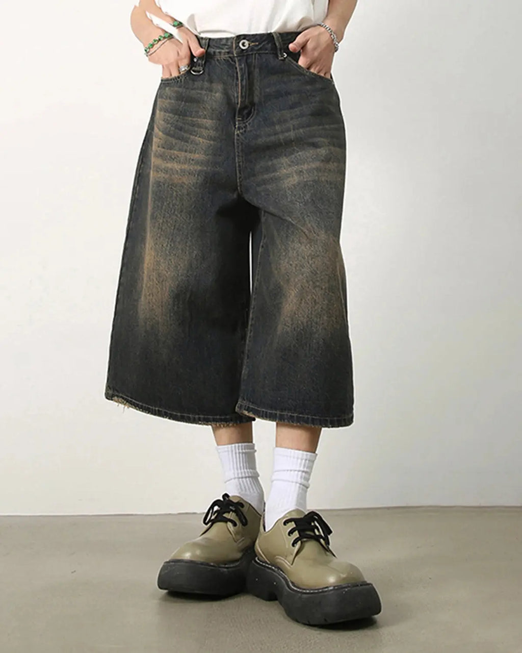 Baggy Jumbo Jorts by INFLATION streetwear, showcasing oversized denim jorts with a relaxed fit and distressed details.