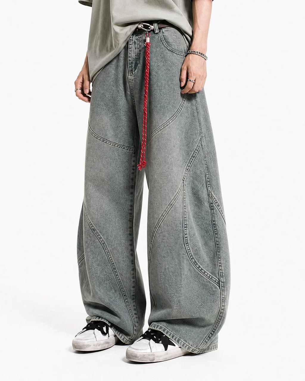 Acid wash stitching baggy jeans by INFLATION featuring relaxed fit, distressed detailing, and contrast stitching for streetwear style.