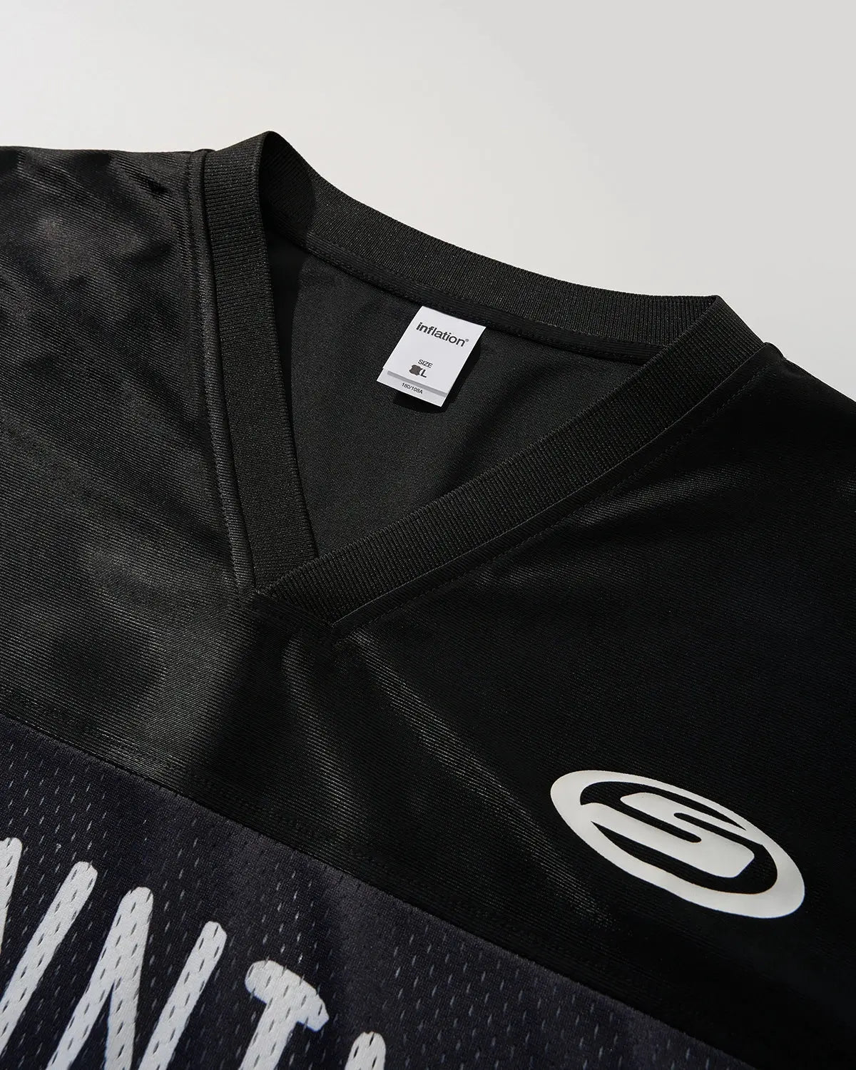 V-Neck Mesh Patchwork Jersey Tee by INFLATION, featuring a stylish mesh and patchwork design in a streetwear style.