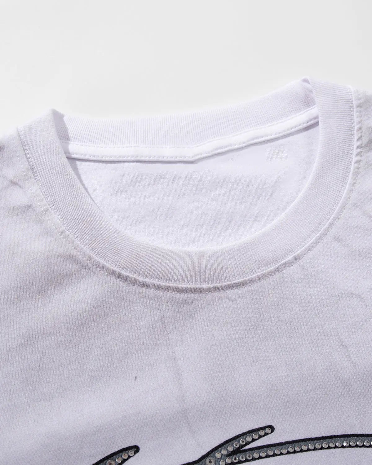 Inflation Streetwear Rhinestone Washed Graphic T-Shirt featuring a bold graphic design on a casual cotton t-shirt.