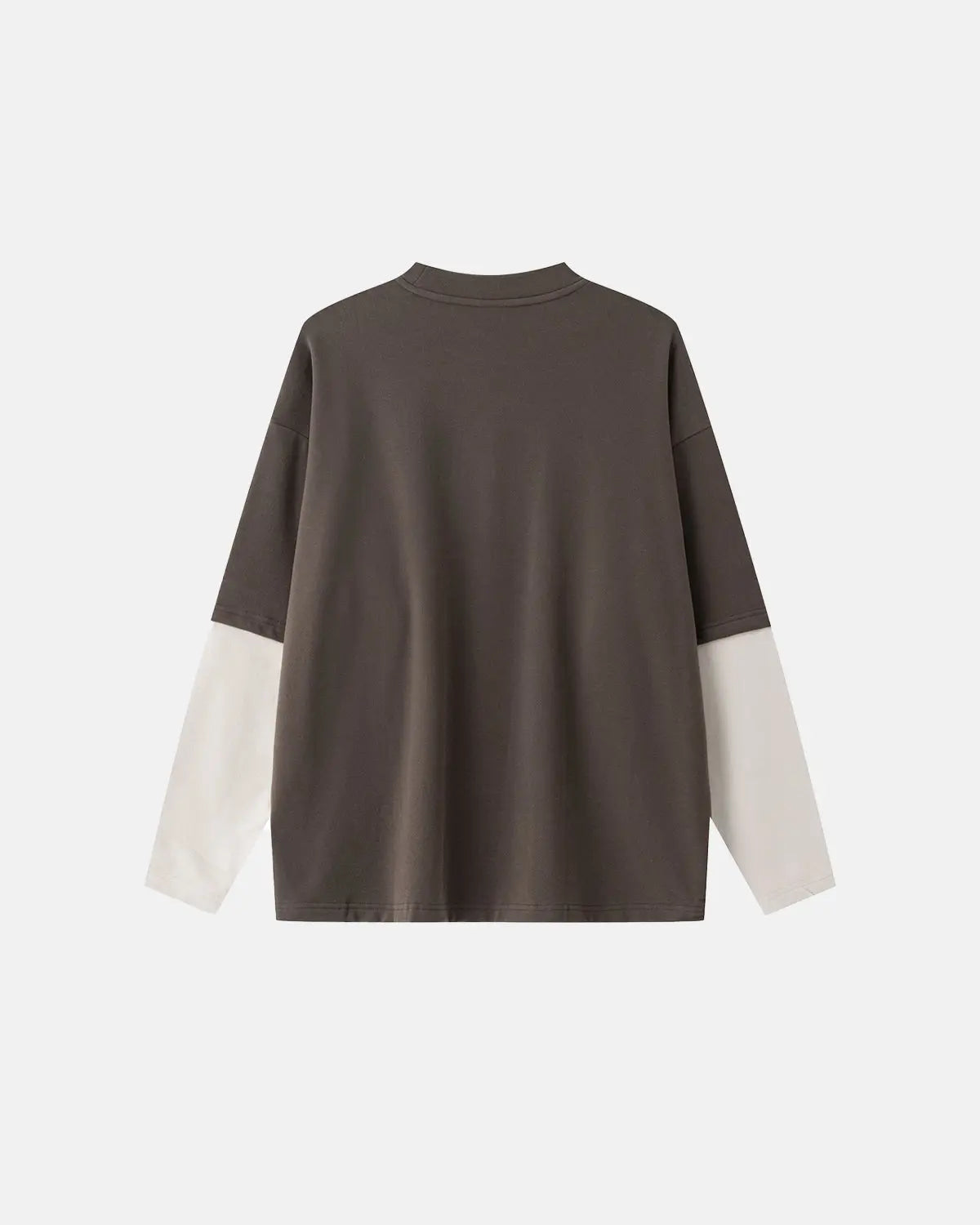 Color block long sleeve tee by Inflation Streetwear, featuring bold color blocking and a relaxed fit on a casual model.