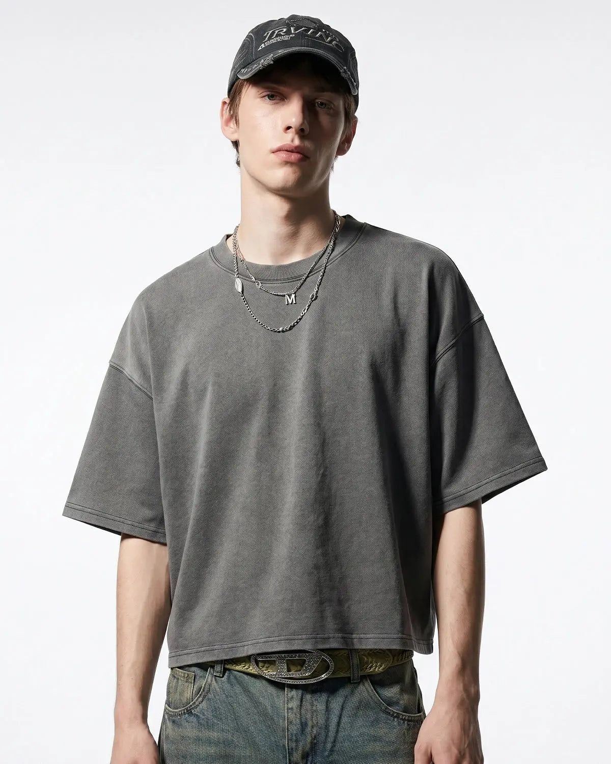 Distressed boxy washed T-shirt by INFLATION Streetwear featuring a relaxed fit and vintage-inspired weathered look.