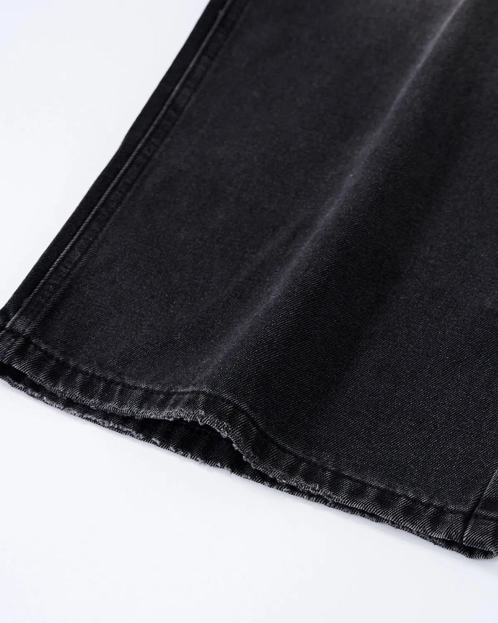 Distressed rhinestone ripped baggy jeans from Inflation Streetwear with rhinestone details and a relaxed, oversized fit.