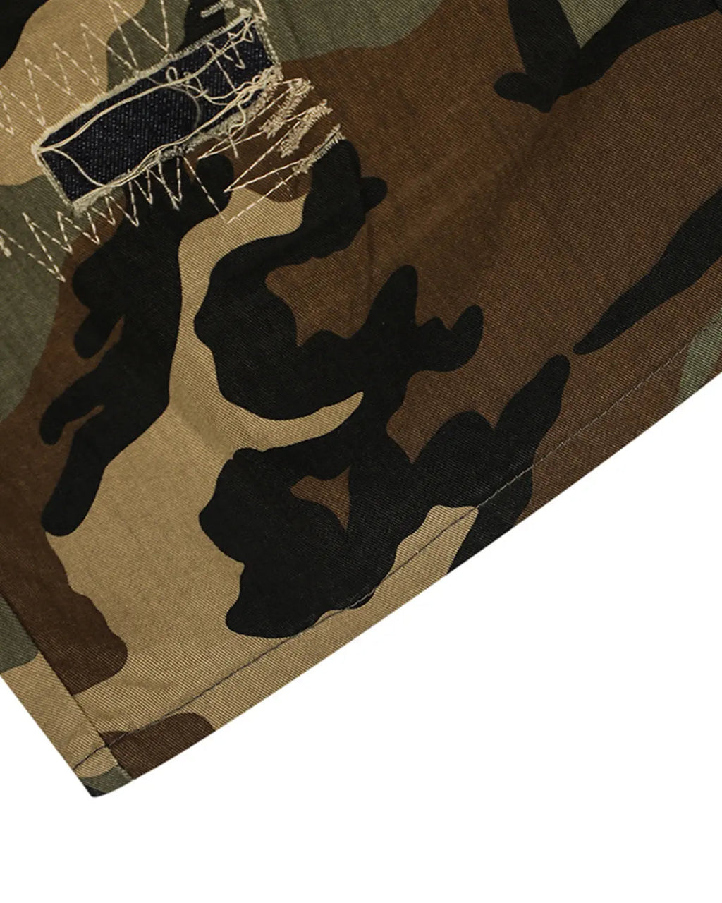 Inflation streetwear camo cargo longline shorts with multiple pockets and relaxed fit, styled with casual urban fashion.