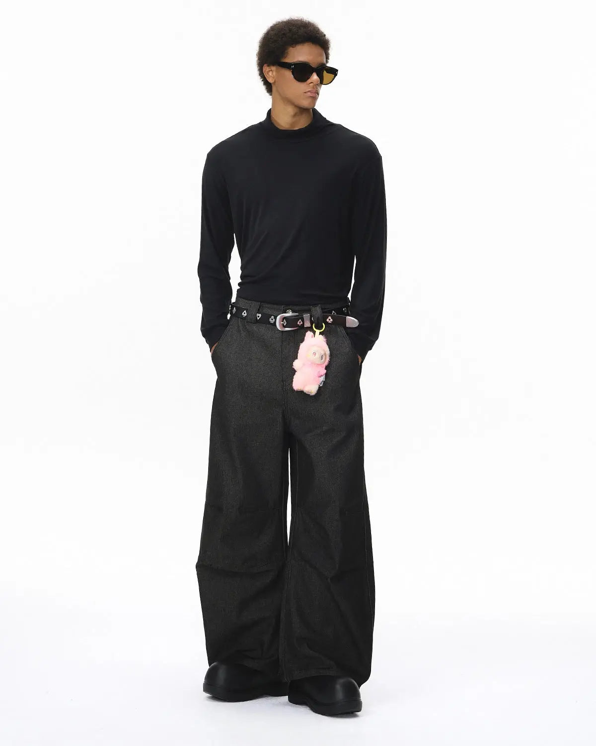 Raw Baggy Barrel Jeans from INFLATION Streetwear featuring a loose fit and distressed denim, shown on a model.