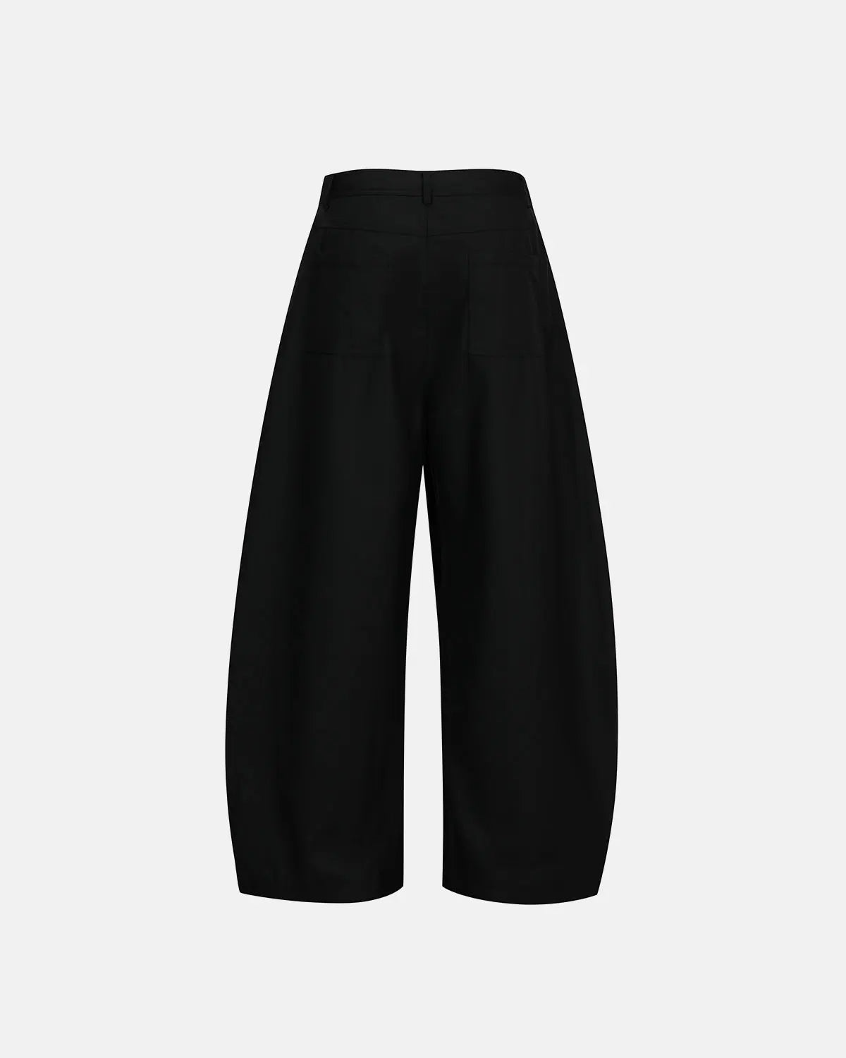 Asymmetric pleated barrel-leg suit pants by INFLATION, showing the unique pleated design and tailored fit in a neutral color.