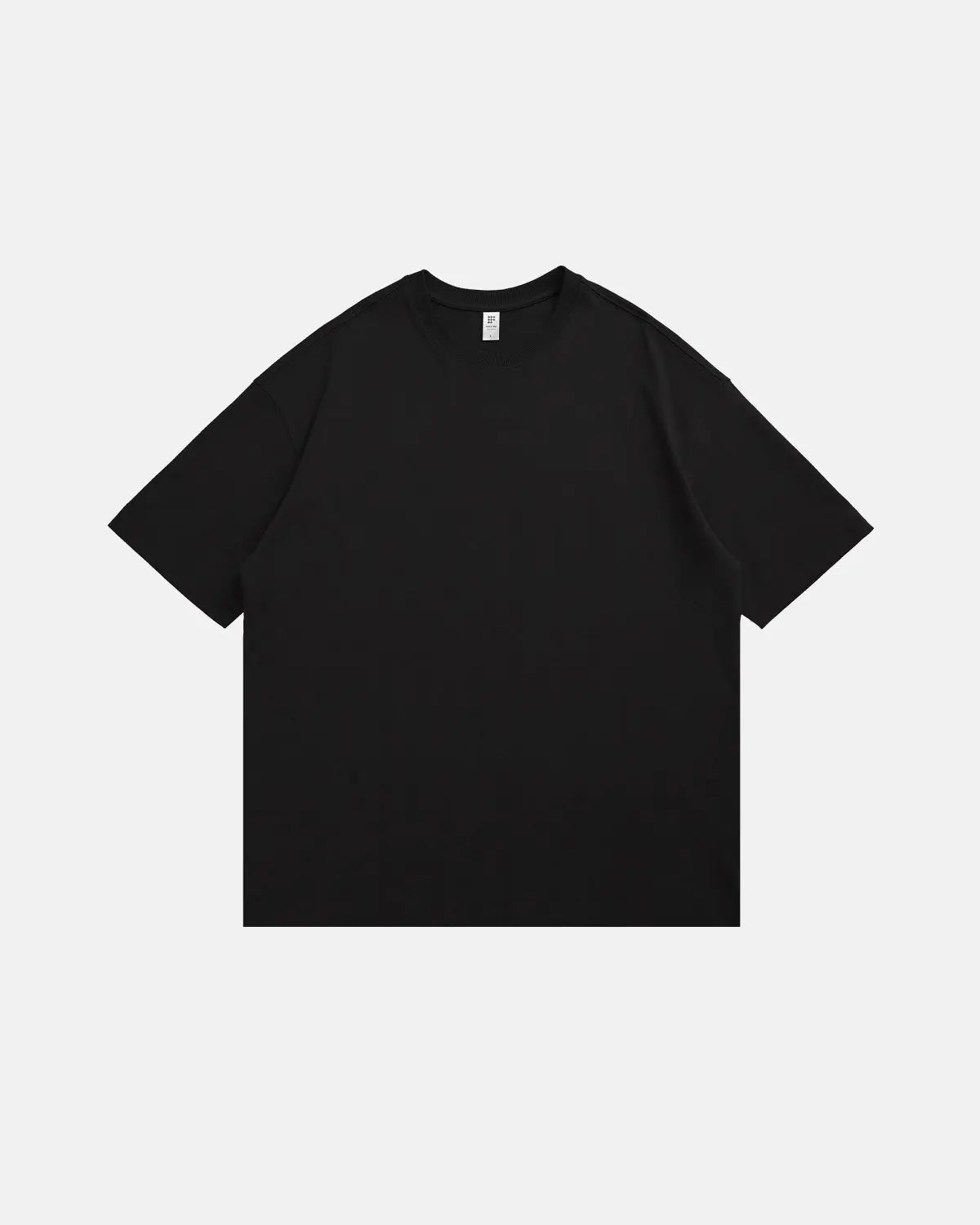 Inflation brand heavyweight cotton oversized T-shirt in black, featuring a relaxed fit and simple streetwear style.