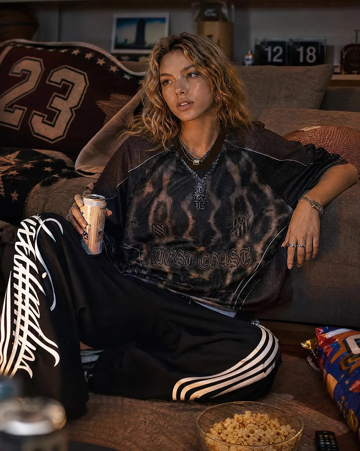 Inflation Script Stripe Baggy Sweatpants featuring a relaxed fit, bold stripe design, and comfortable streetwear style.