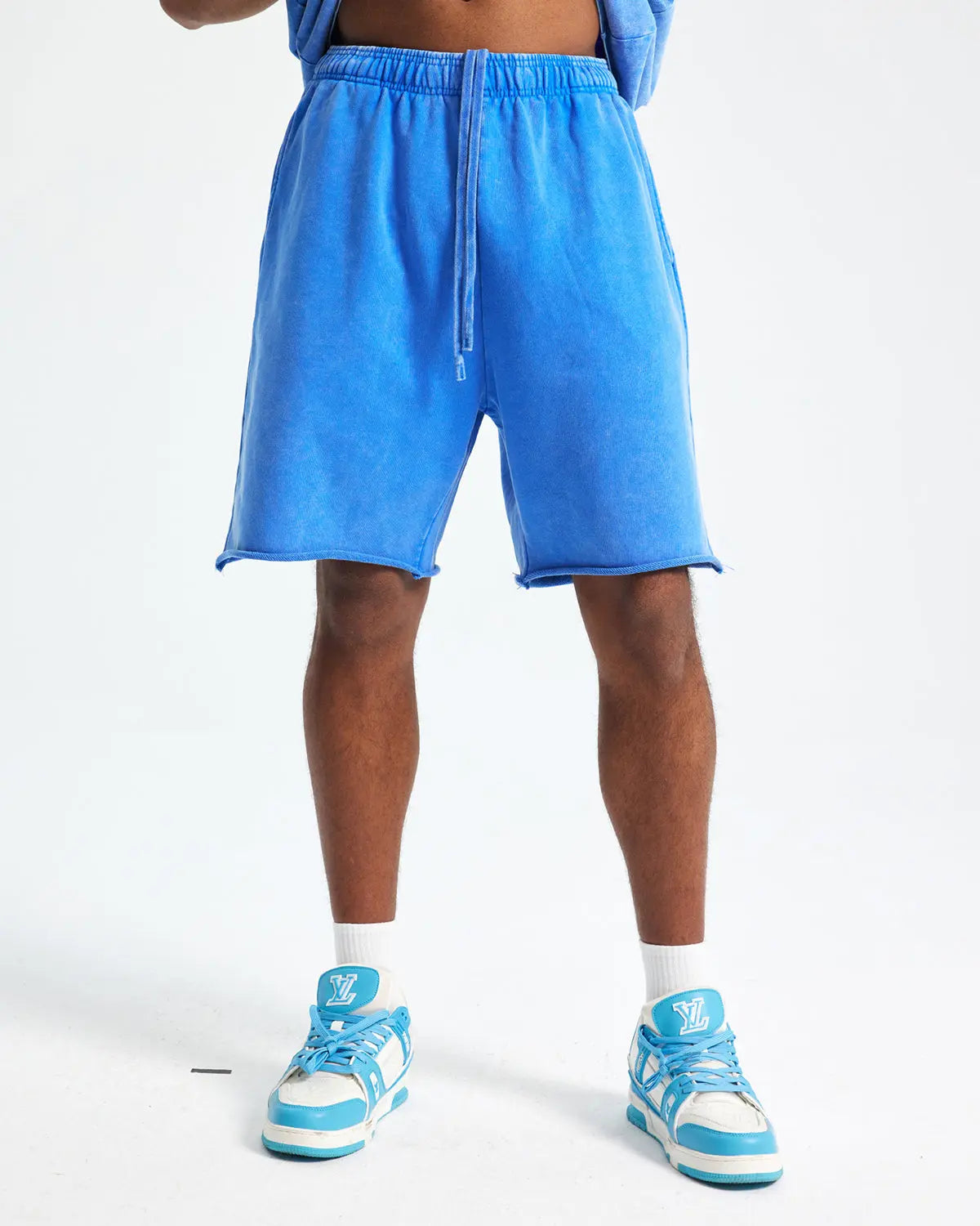 Inflation heavyweight washed sweat shorts showing relaxed fit, soft fabric, and streetwear style in a casual setting.