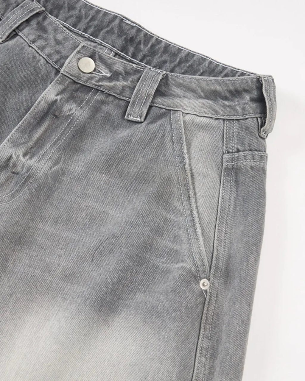Blue acid wash barrel jeans by Inflation Streetwear, showcasing relaxed fit denim with faded, distressed details.