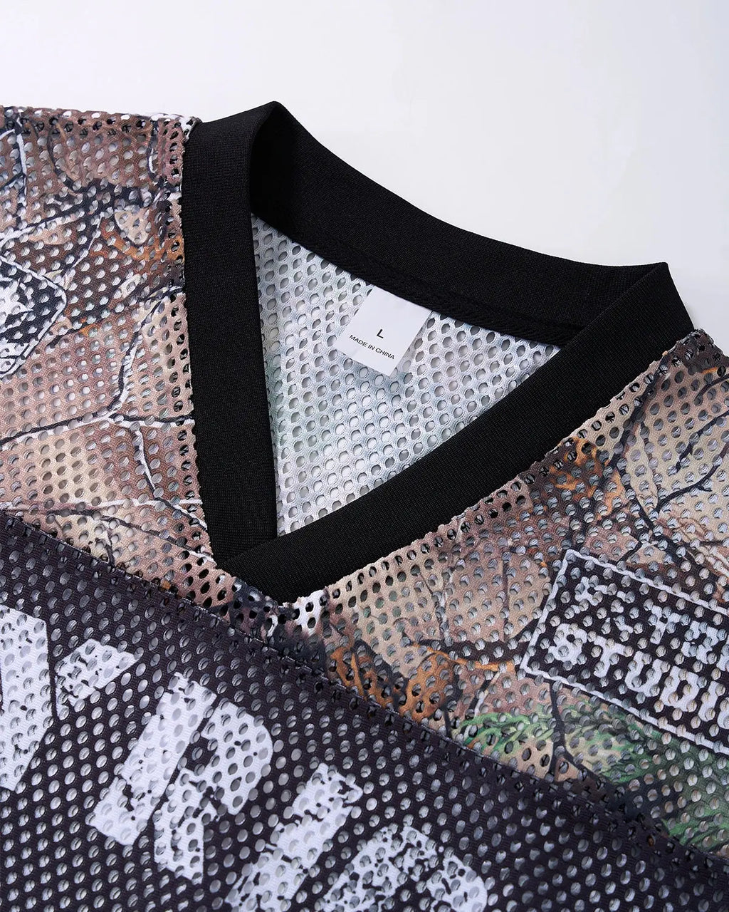 Camo mesh digital print jersey tee by INFLATION Streetwear featuring camouflage pattern and relaxed fit.