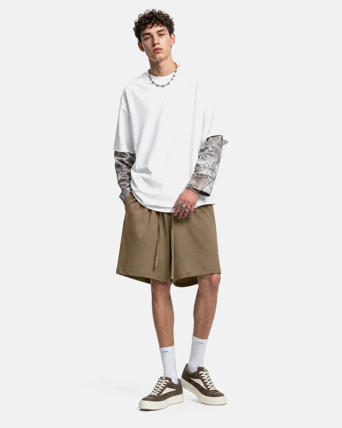 Black heavyweight drawstring sweat shorts from INFLATION Streetwear, featuring a relaxed fit and casual style.
