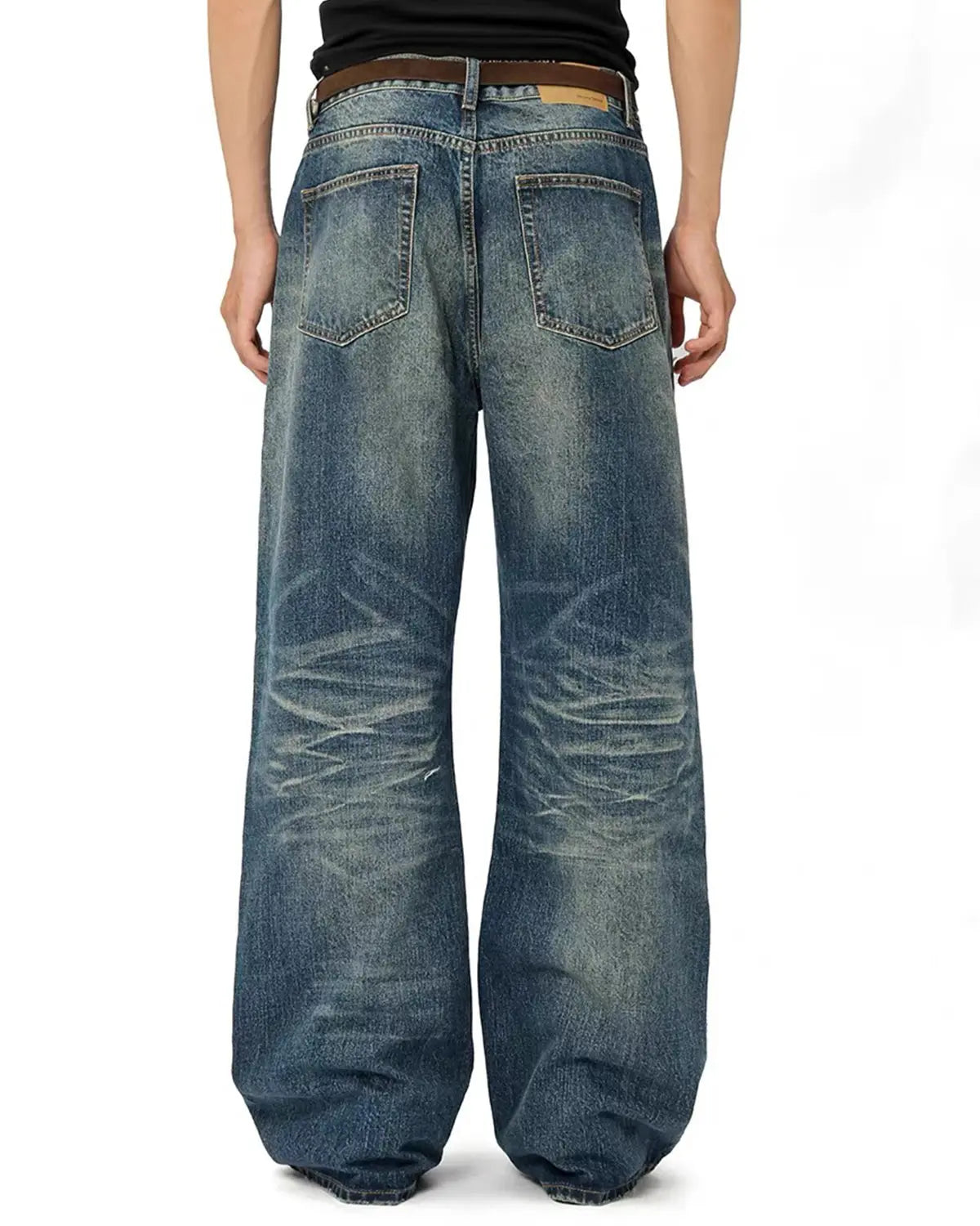 Vintage distressed baggy jeans by Inflation Streetwear with a relaxed fit and faded, worn-in denim appearance.