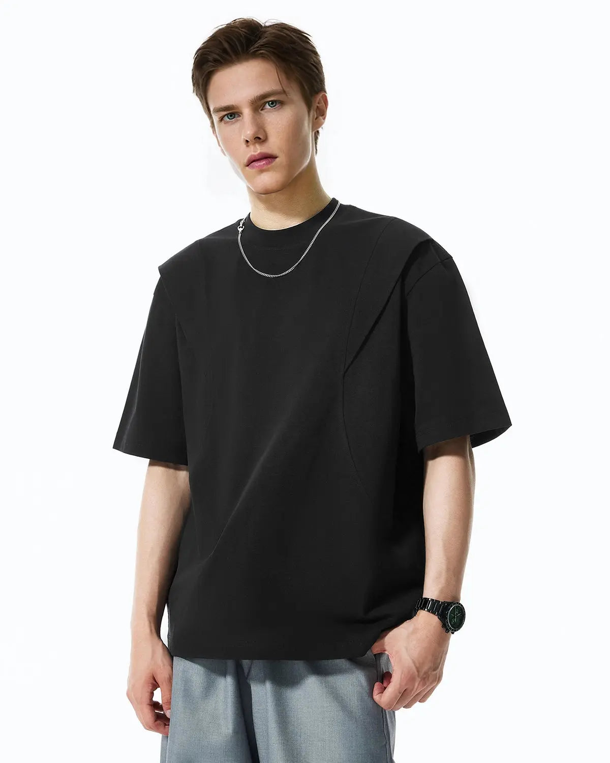 Deconstructed oversized T-shirt by INFLATION Streetwear, featuring broken seams and layered fabric details on a casual fit.