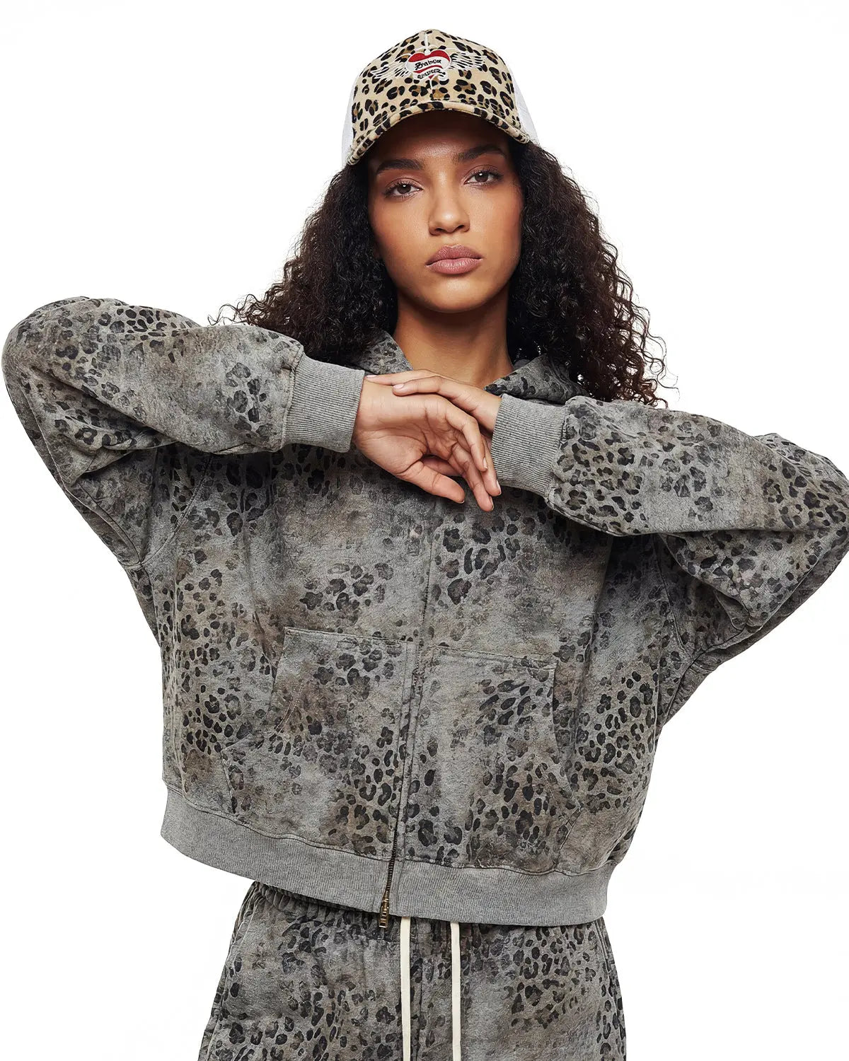 Leopard print boxy zip-up hoodie from Inflation Streetwear featuring a front zipper and relaxed fit.
