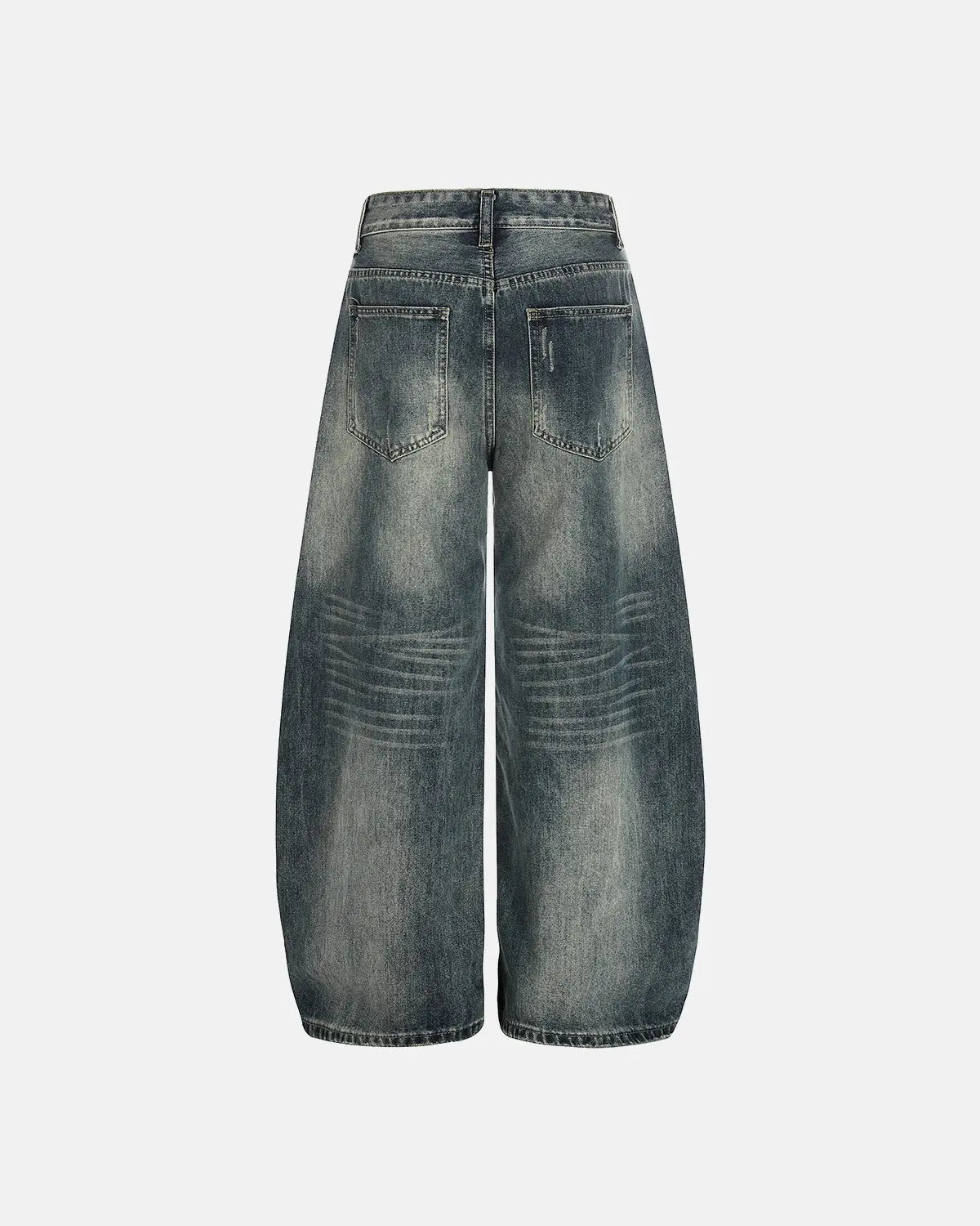 Acid washed ripped baggy barrel jeans by INFLATION, featuring distressed details and loose fit, displayed on a model.