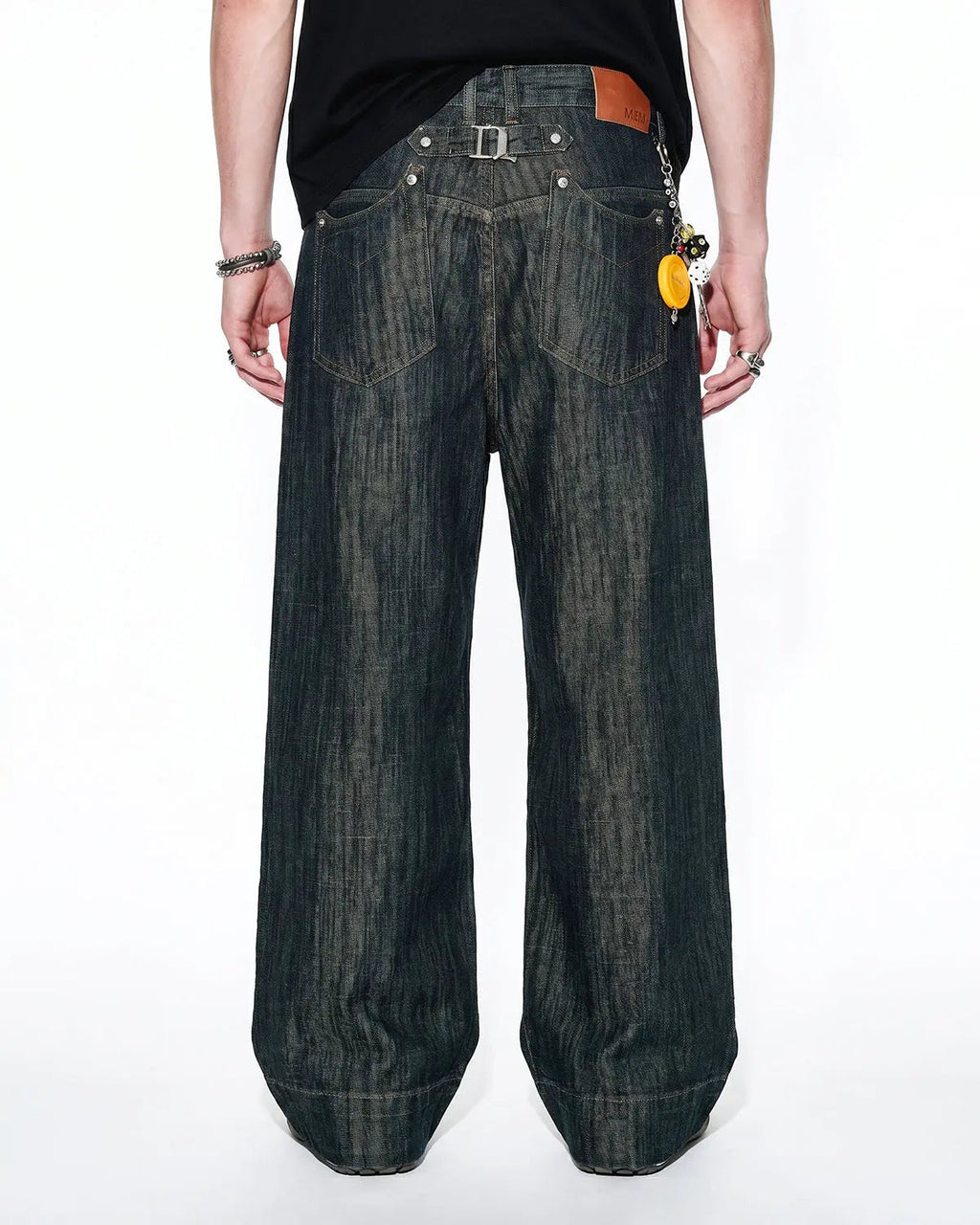 Inflation INFLATION bamboo weave jeans with cinch back, showcasing relaxed fit and stylish streetwear design.