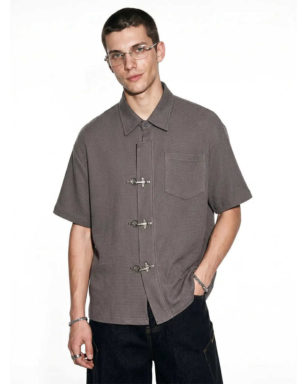 Inflation Streetwear metal clasp waffle shirt featuring a textured fabric and button closure, casual streetwear style for men.