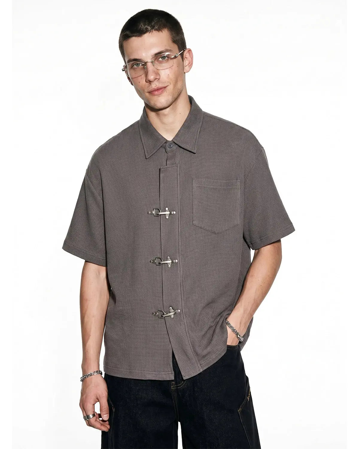 Inflation Streetwear metal clasp waffle shirt featuring a textured fabric and button closure, casual streetwear style for men.