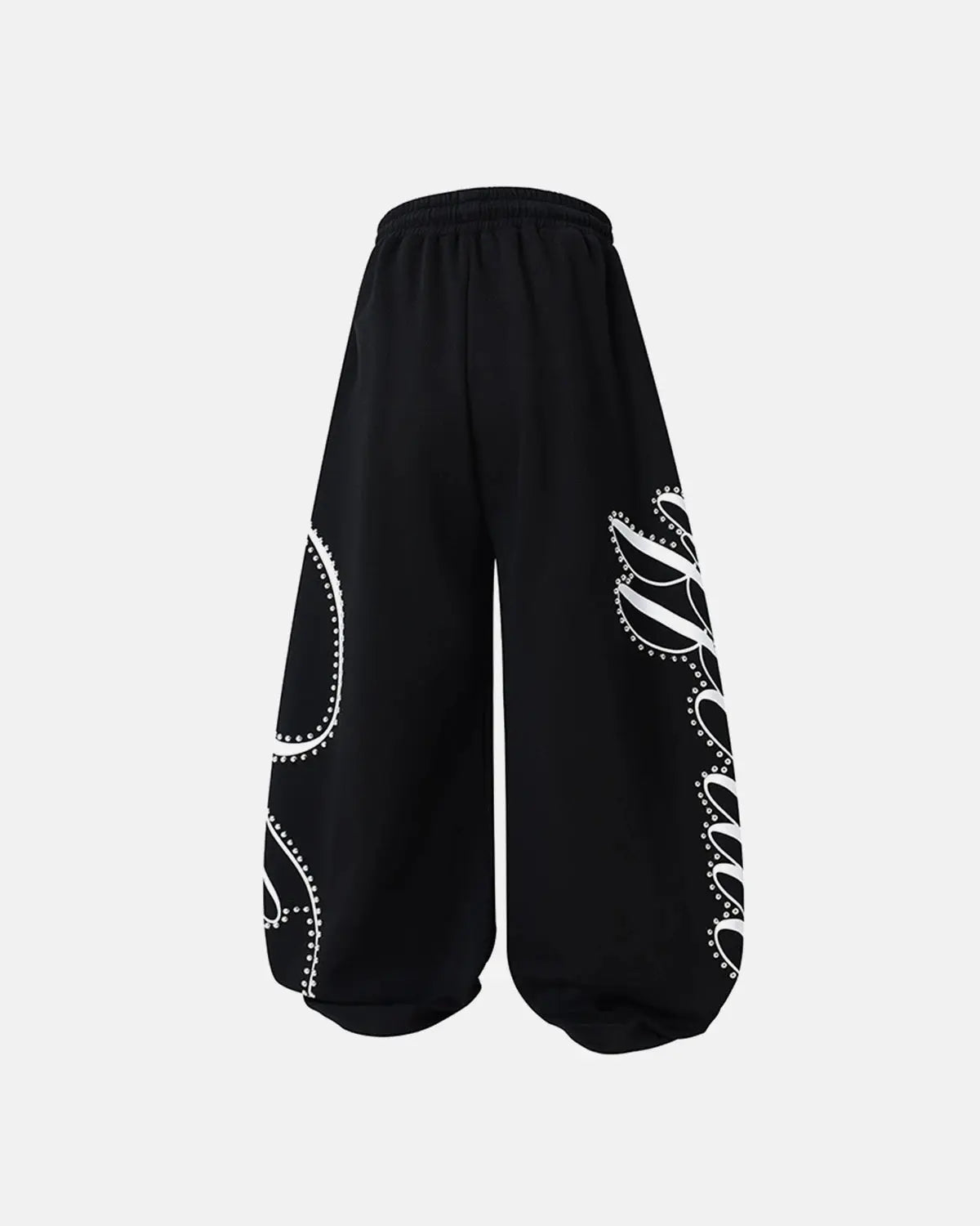 Rhinestone script baggy sweatpants by INFLATION featuring a relaxed fit and bold rhinestone lettering on soft streetwear fabric.