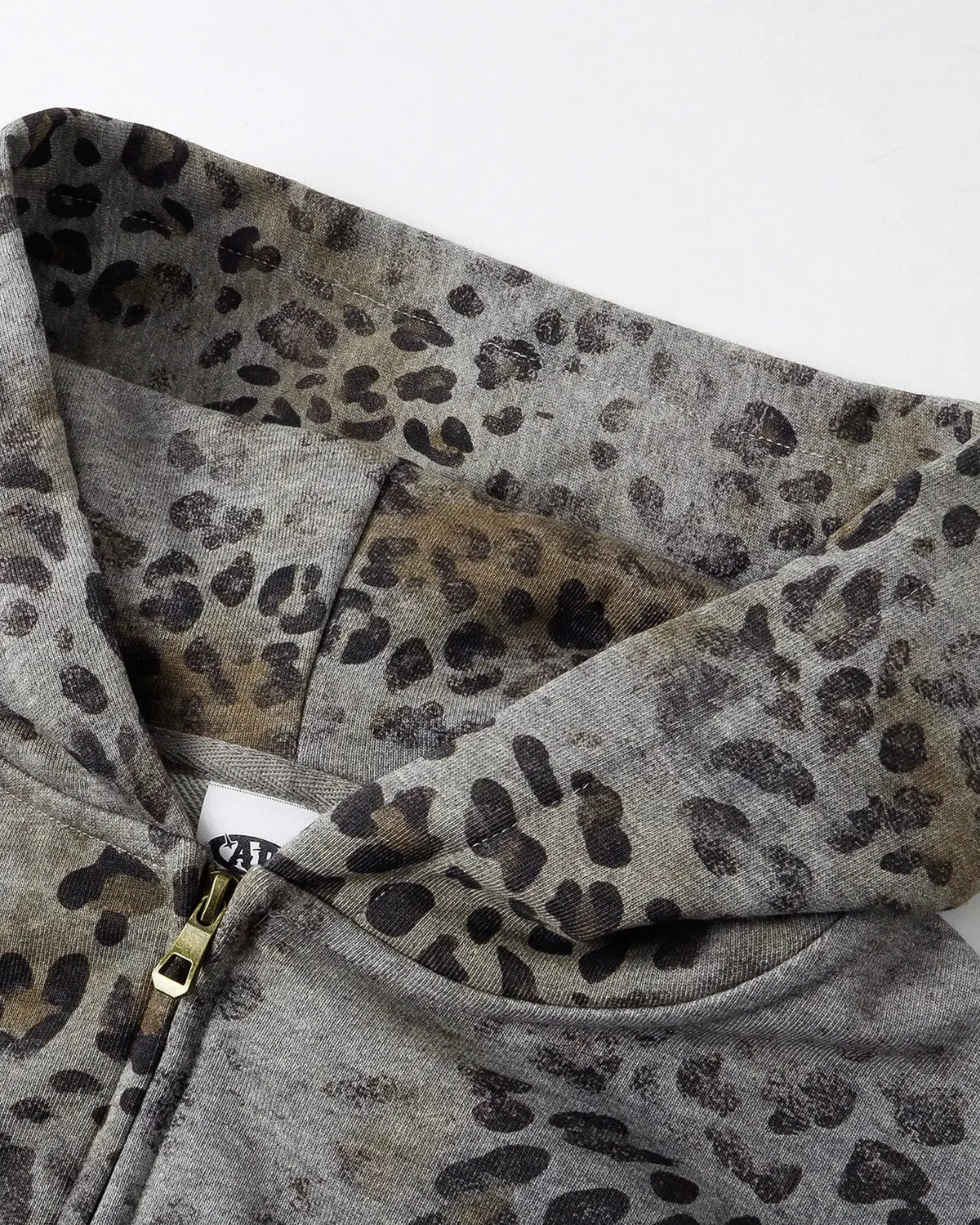 Leopard print boxy zip-up hoodie by INFLATION Streetwear featuring a bold animal pattern and casual fit.