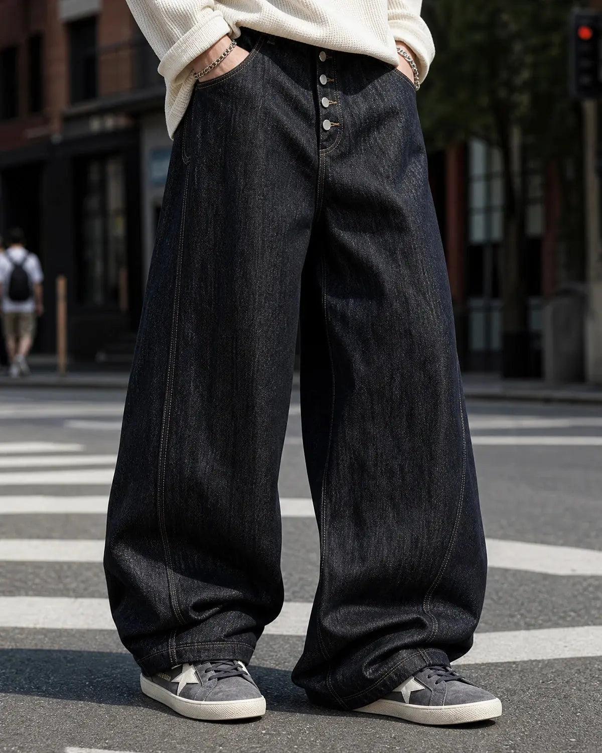 Black buttons-up barrel baggy jeans by INFLATION Streetwear featuring a relaxed, oversized fit and stylish button details.