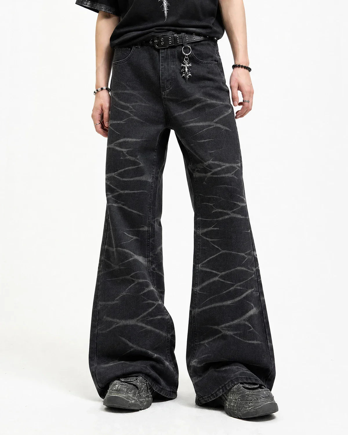 Black Whisker Wash Bootcut Jeans by Inflation Streetwear, showcasing the fit and distressed denim details.